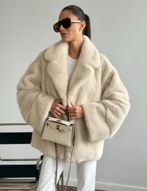 Женский норковый полушубок