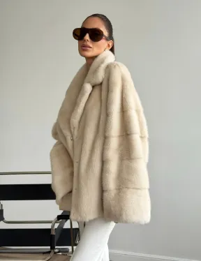 Женский норковый полушубок