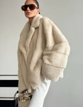 Женский норковый полушубок