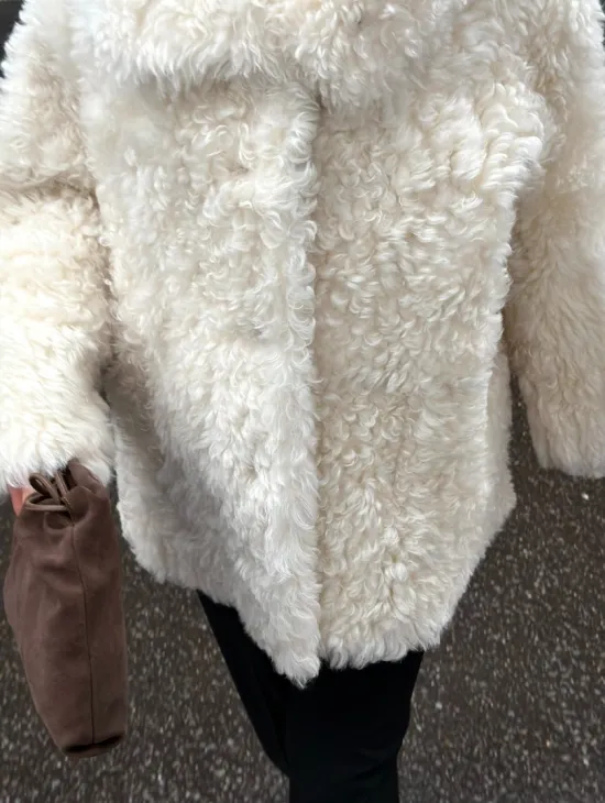 Белая шубка из тиградо