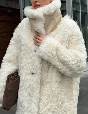 Белая шубка из тиградо