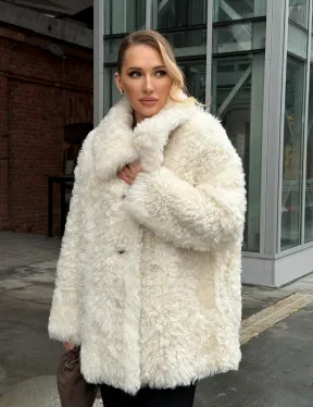 Белая шубка из тиградо