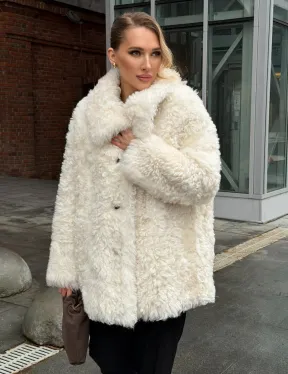 Белая шубка из тиградо