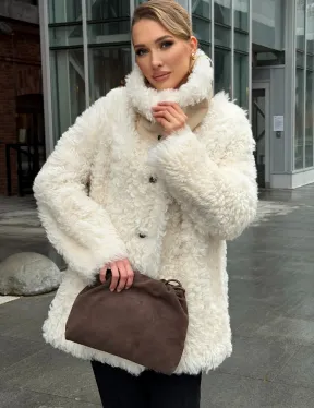 Белая шубка из тиградо