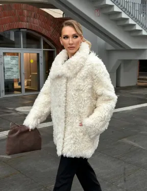 Белая шубка из тиградо