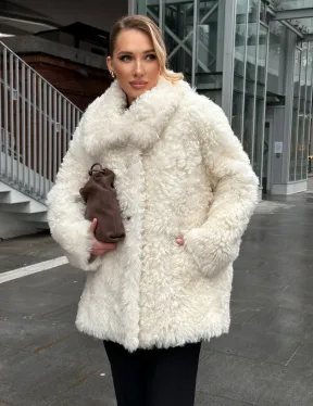 Белая шубка из тиградо