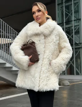 Белая шубка из тиградо