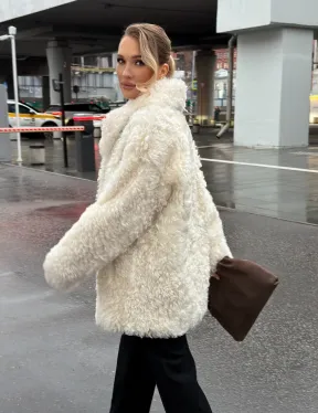 Белая шубка из тиградо