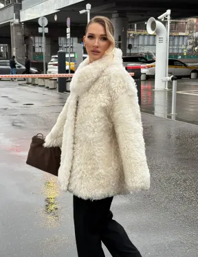 Белая шубка из тиградо