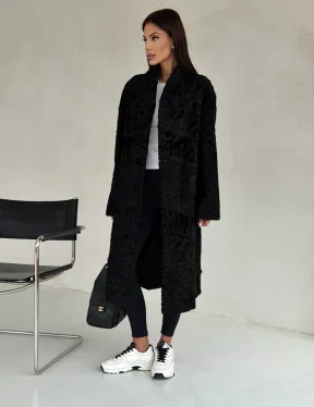 Черная шуба из каракуля