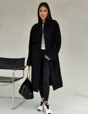 Черная шуба из каракуля