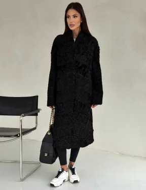 Черная шуба из каракуля