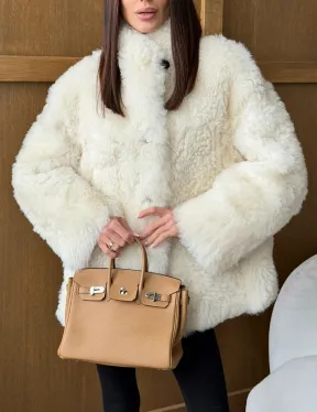 Светлая женская двухсторонняя дубленка