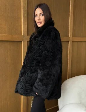 Черная двухсторонняя дубленка из меха тиградо