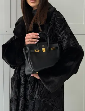 Черная шуба из каракуля с норкой