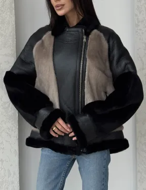 Черная дубленка из овчины с рукавами из меха норки